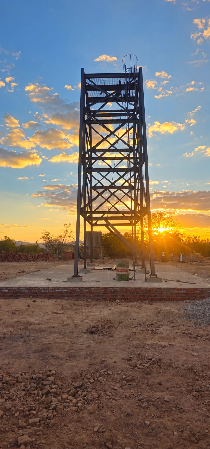 Anzac mine shaft headgear silhouetted against the sunset